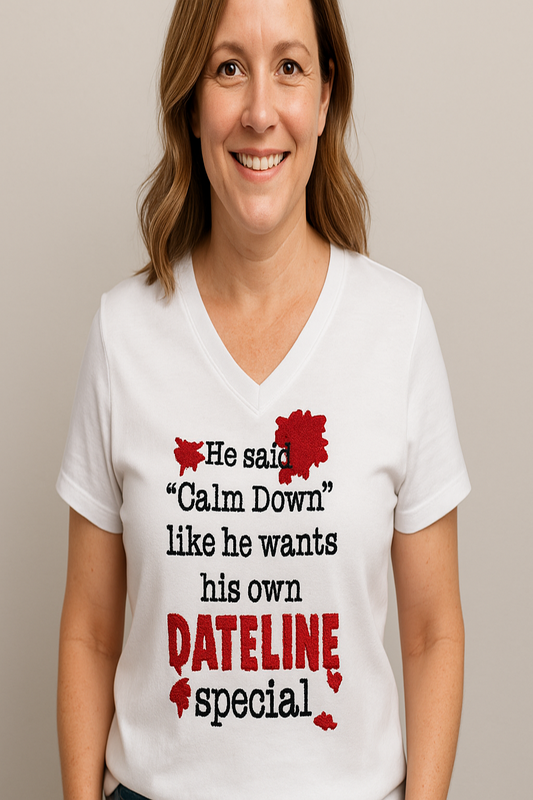 Woman wearing a white t-shirt with humorous text design on a plain background