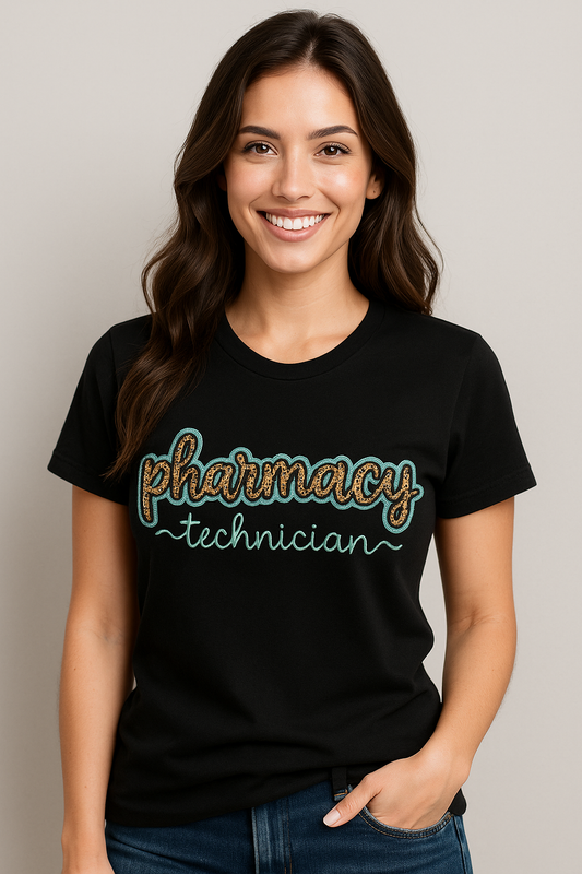 Woman wearing a black t-shirt with 'pharmacy technician' text on a plain background